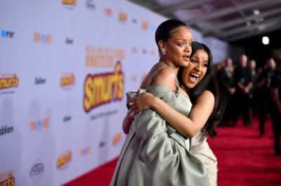 Rihanna’s Heartwarming Reunion with Cardi B at Smurfs Movie Event Stuns Fans – Their Emotional Embrace and Cardi’s Surprise Role Ignite Frenzy!